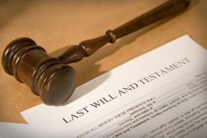 last will and testament form with gavel, shallow dof